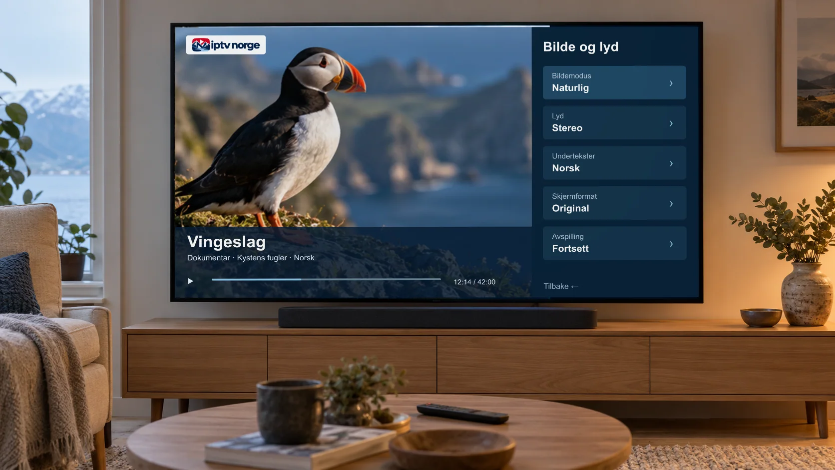 TV i en stue som viser et naturprogram med menyen for bilde, lyd og norsk tekst åpen